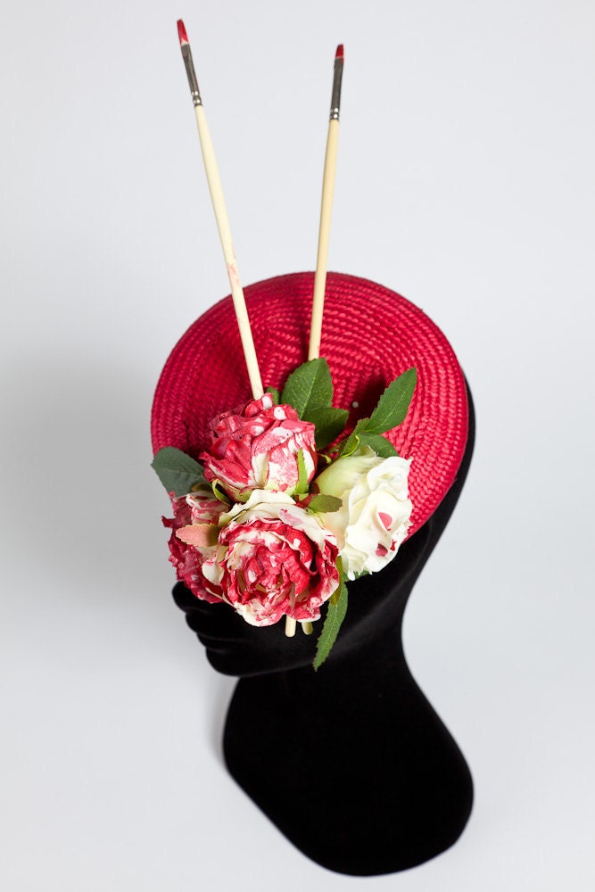 The Alice In Wonderland Hat Painting The Roses Red