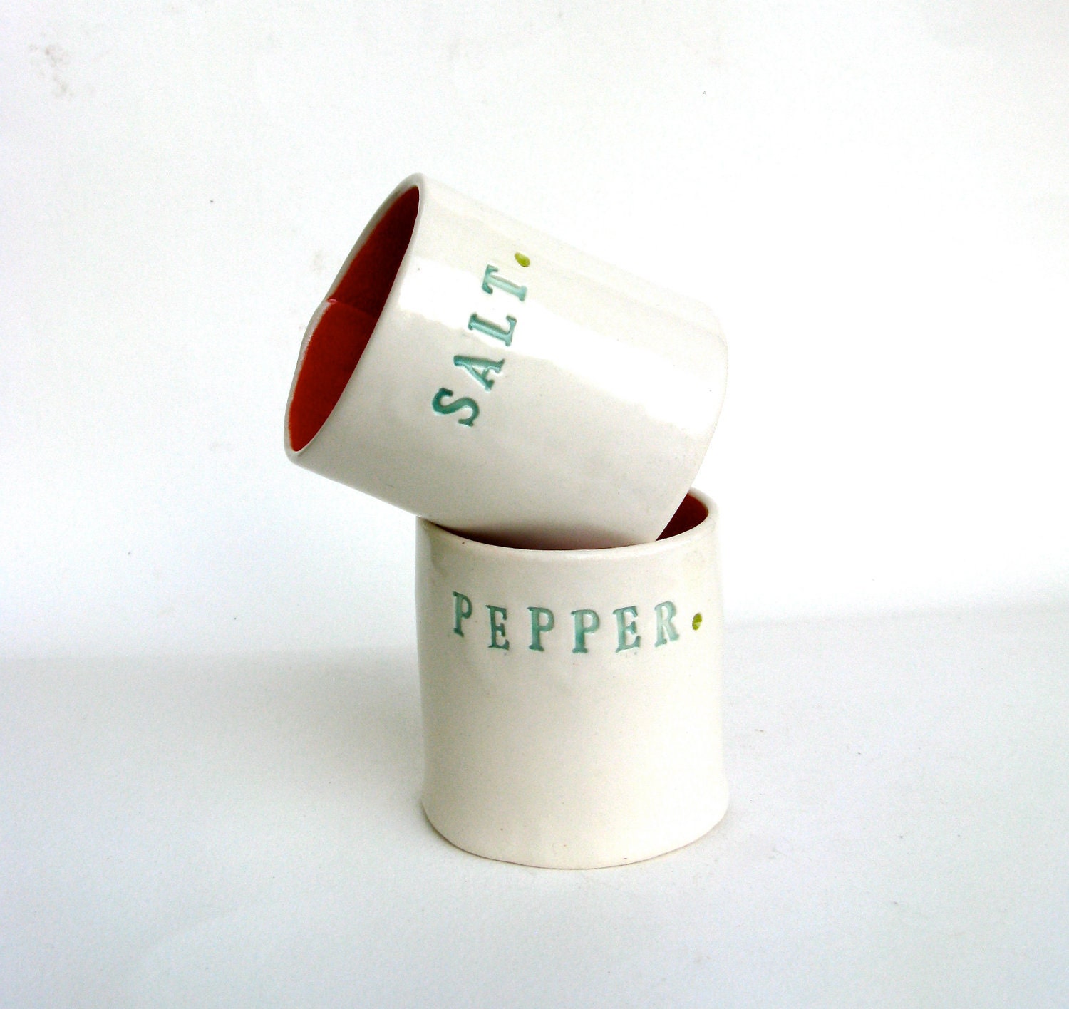 please pass the salt ... hand built porcelain salt and pepper cellars ... vessels