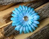 Beautiful Turquoise Gem Daisy hair flower with crocheted headband.  Flower is detachable.