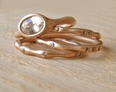 Moissanite and 14 Karat Rose Gold Oval Water Set Conflict Free Gems and Recycled Gold-Deposit