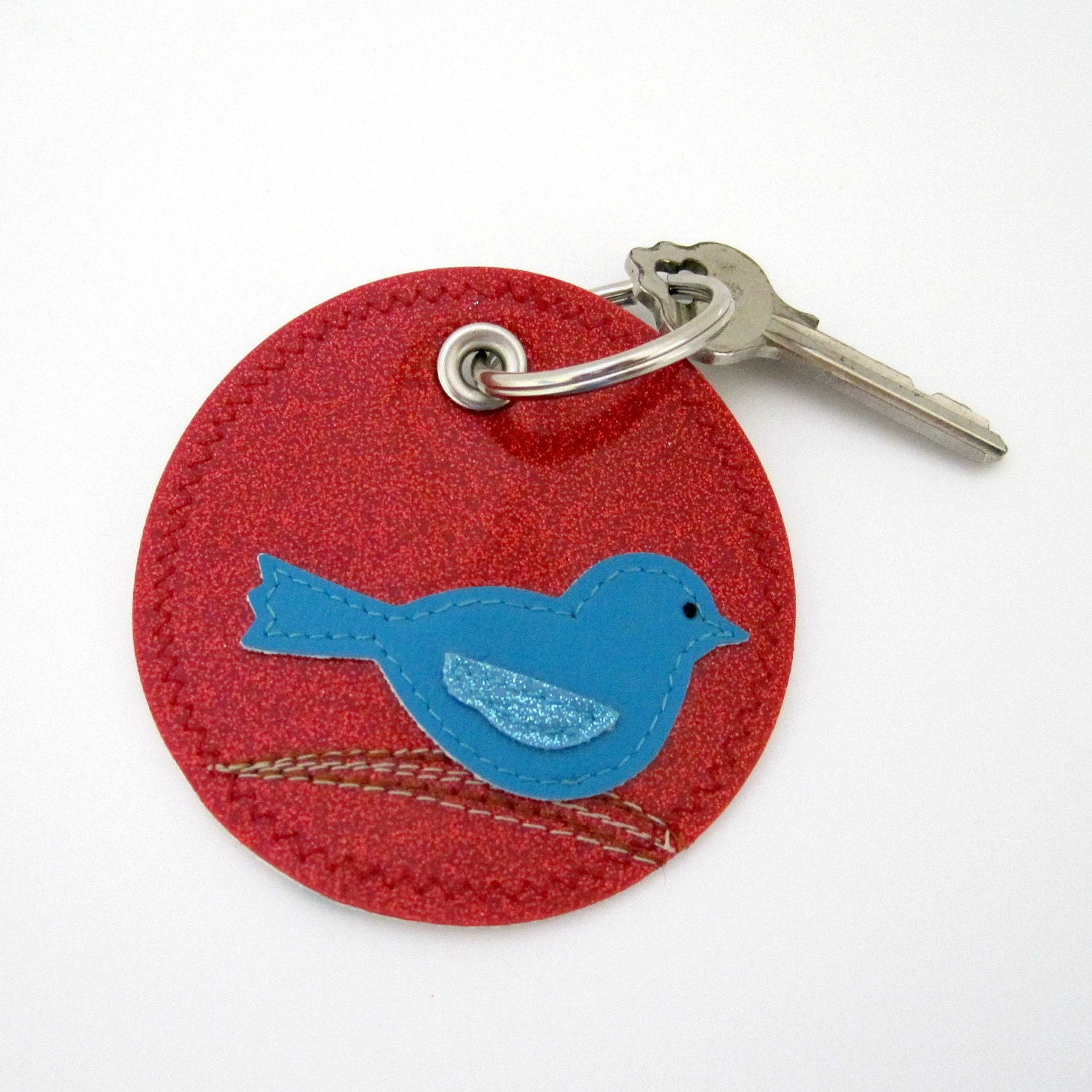 Vinyl Keychain, Circle with Bird on a Reed Design, ruby red sparkle vinyl / sky blue polka dot oilcloth
