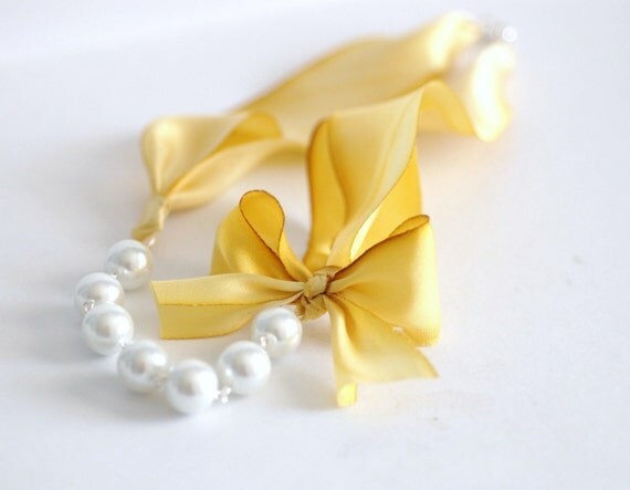 The Original Carrie Necklace in Sunny, a romantic yellow ribbon and pearl bridesmaid necklace