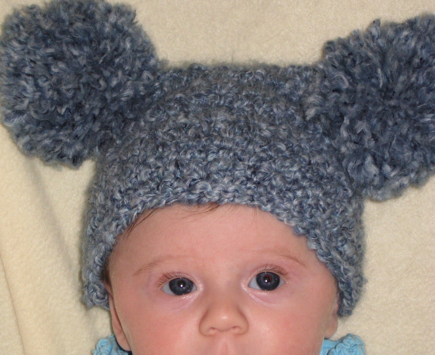 Blue denim crocheted newborn to 4 months hat with pom poms