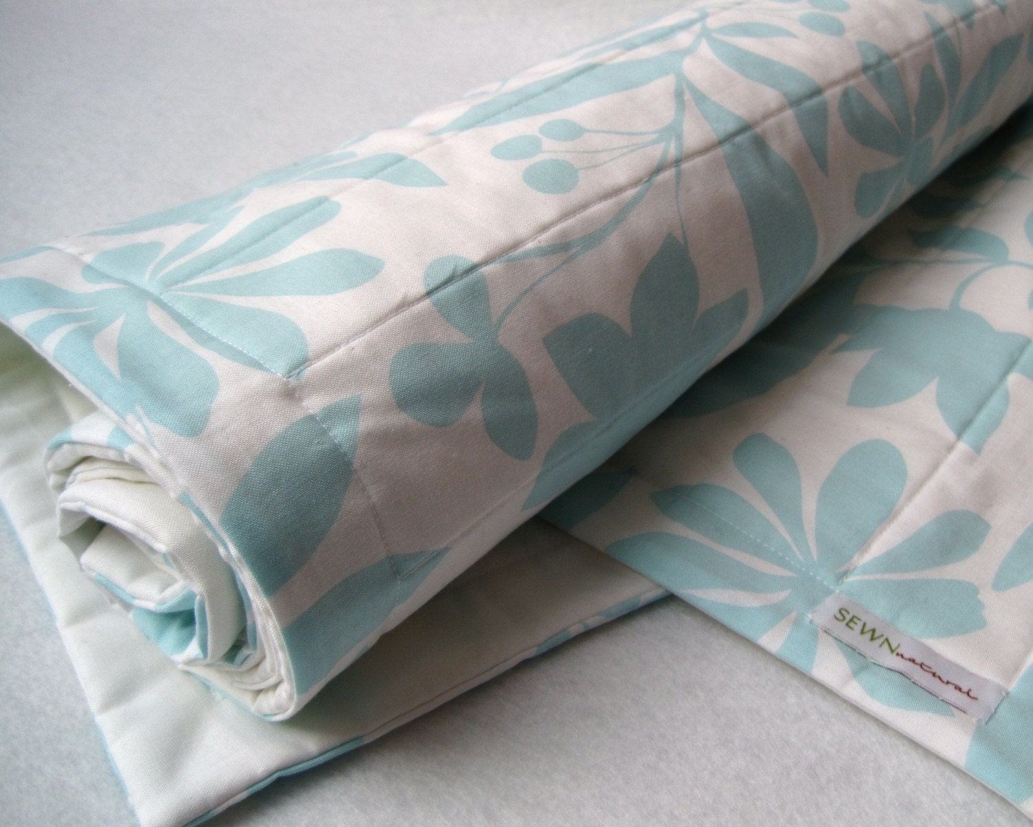 Organic baby quilt in eco friendly pale whisper spring pastel blue - modern kids crib bedding