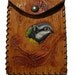 Hand carved wallet with blue tit