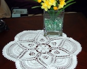 crocheted white doily.