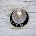 Hand stamped sterling silver 3/4 inch pendant with lovely 1 inch aluminum frame and 4mm glass pearl drop- choose joy
