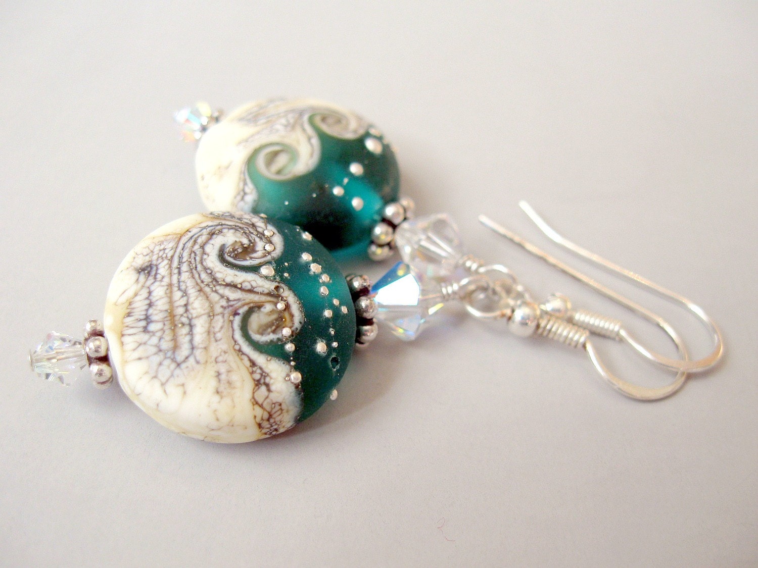 Ocean inspired earrings with crystals. Sterling silver.