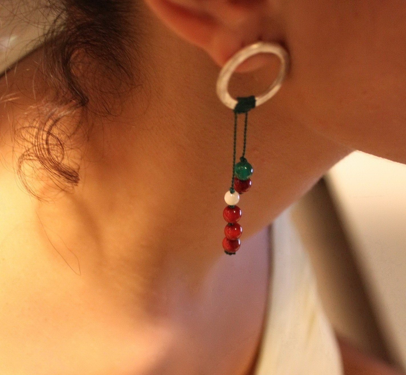 Omicron posts, green onyx and red coral