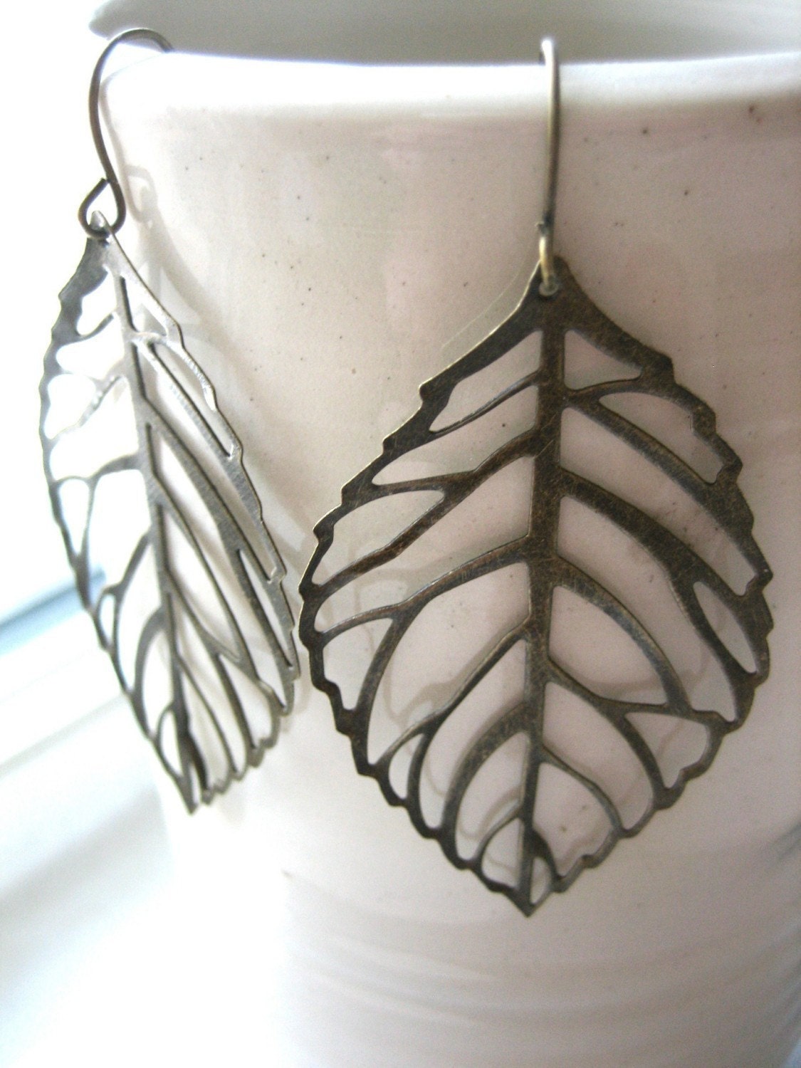 falling leaf earrings. antique bronze filigrees.