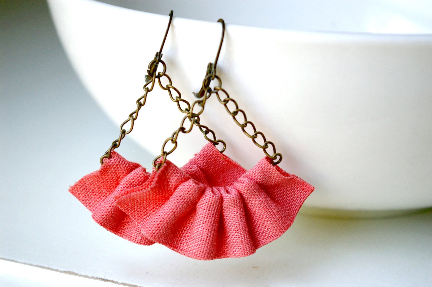 linen ruffle earrings in coral. available in several other colors.
