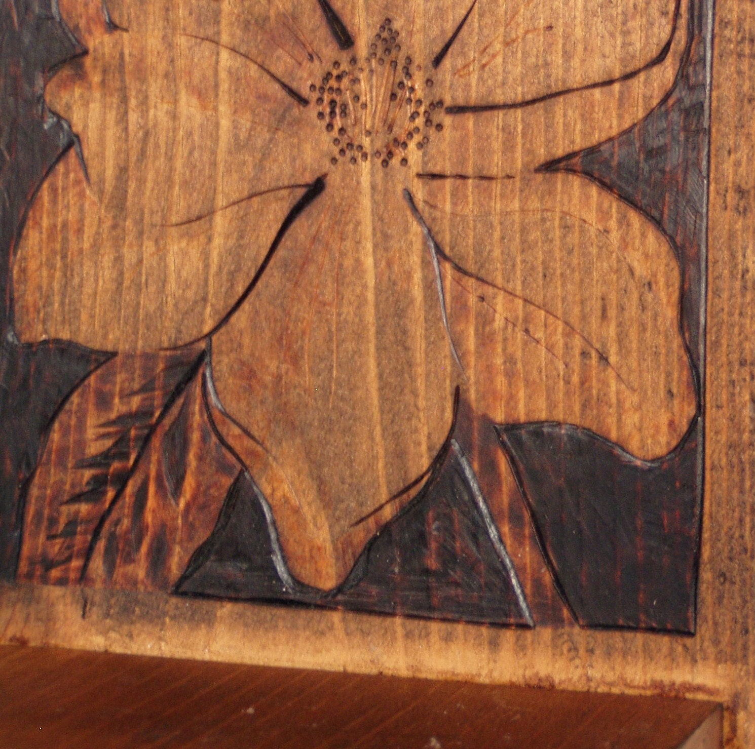 woodburned pine wall sconce . . .