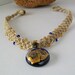 Blown Glass Pendant Hemp Choker with Blue and Orange Mini Beads