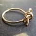 DON'T FORGET. 14 K gold filled wire bow  ring in your size