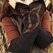 Reversible pixie arm warmers.