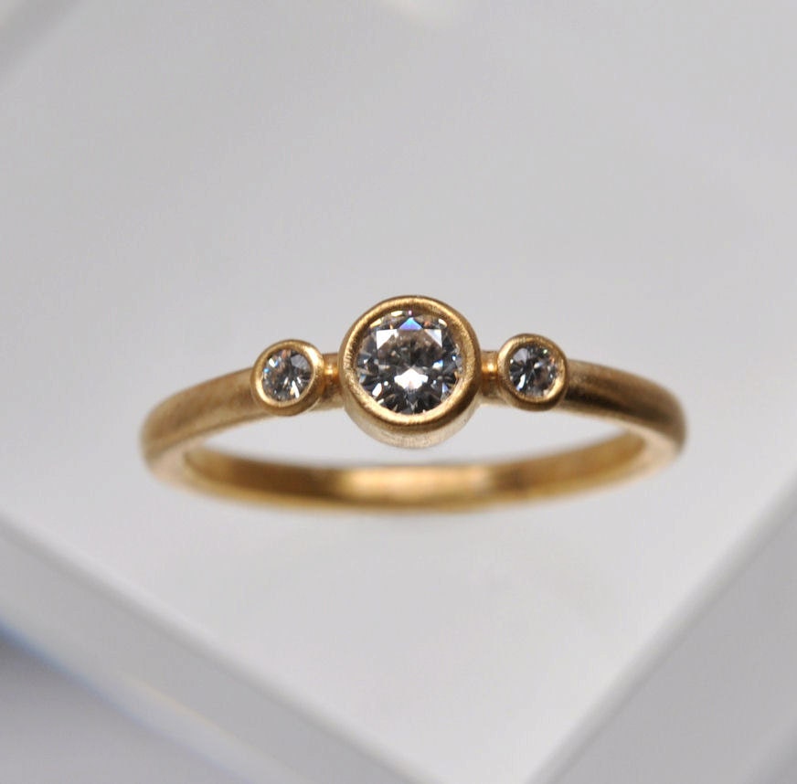 0.23 carat -  three diamond engagement ring -  18k gold