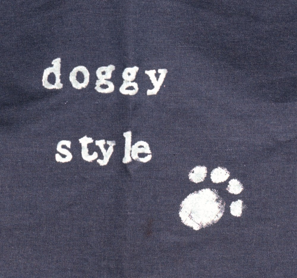Cheeky paw print tea towel