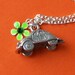Beetle Car Charm Necklace with Green Flower