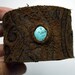 Peak-a-boo Turquoise Recycled Leather Cuff