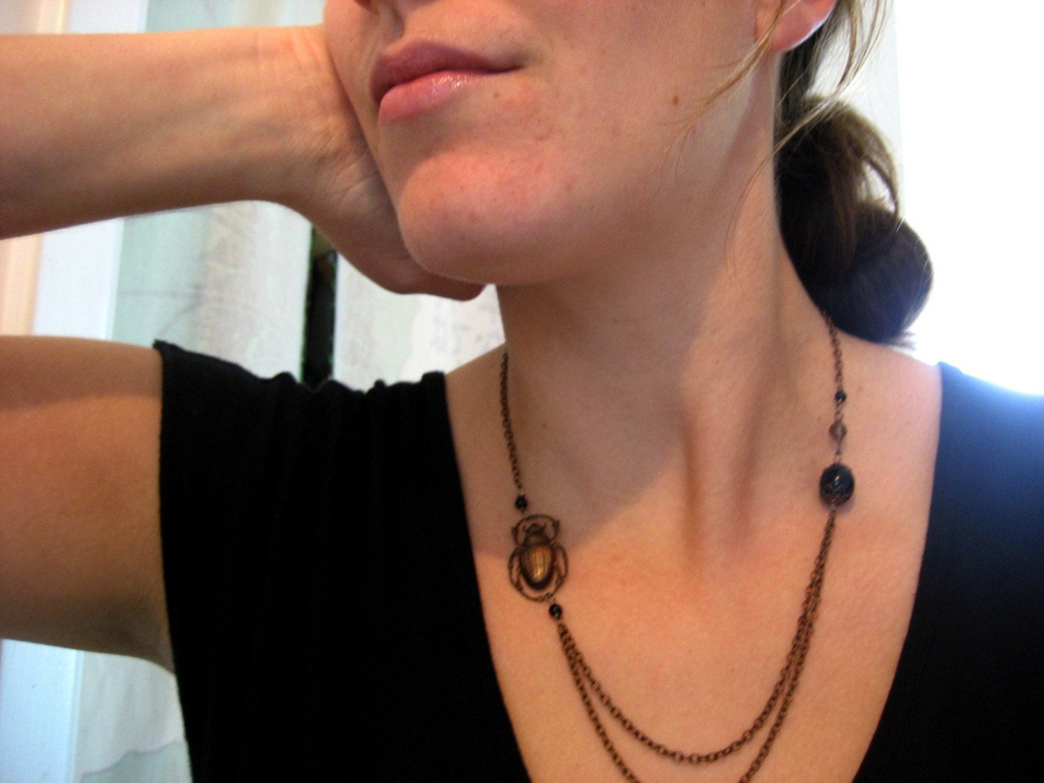 Alex Necklace - asymmetrical vintage style necklace with brass, smokey quartz, vintage glass, and a scarab charm