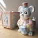 circus theme nursery, vintage ceramic baby planters, teddy bear