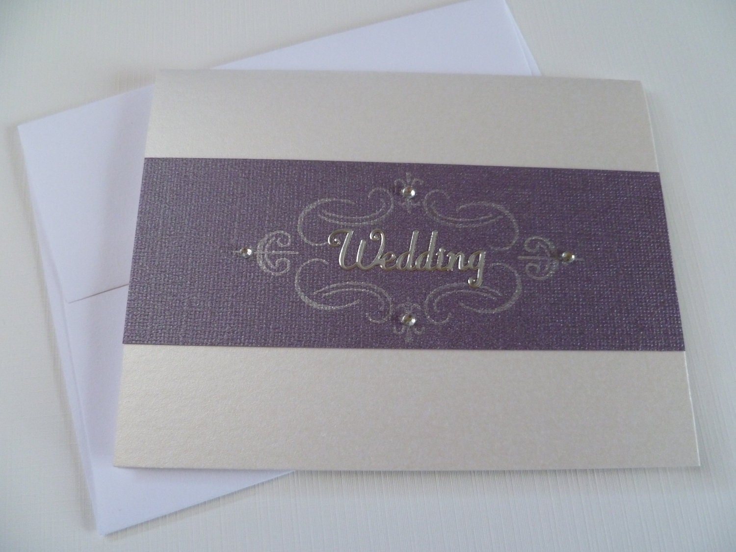 Elegant purple and cream wedding card