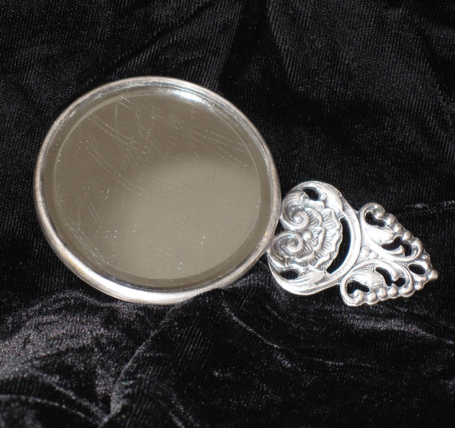 Small vintage hand mirror