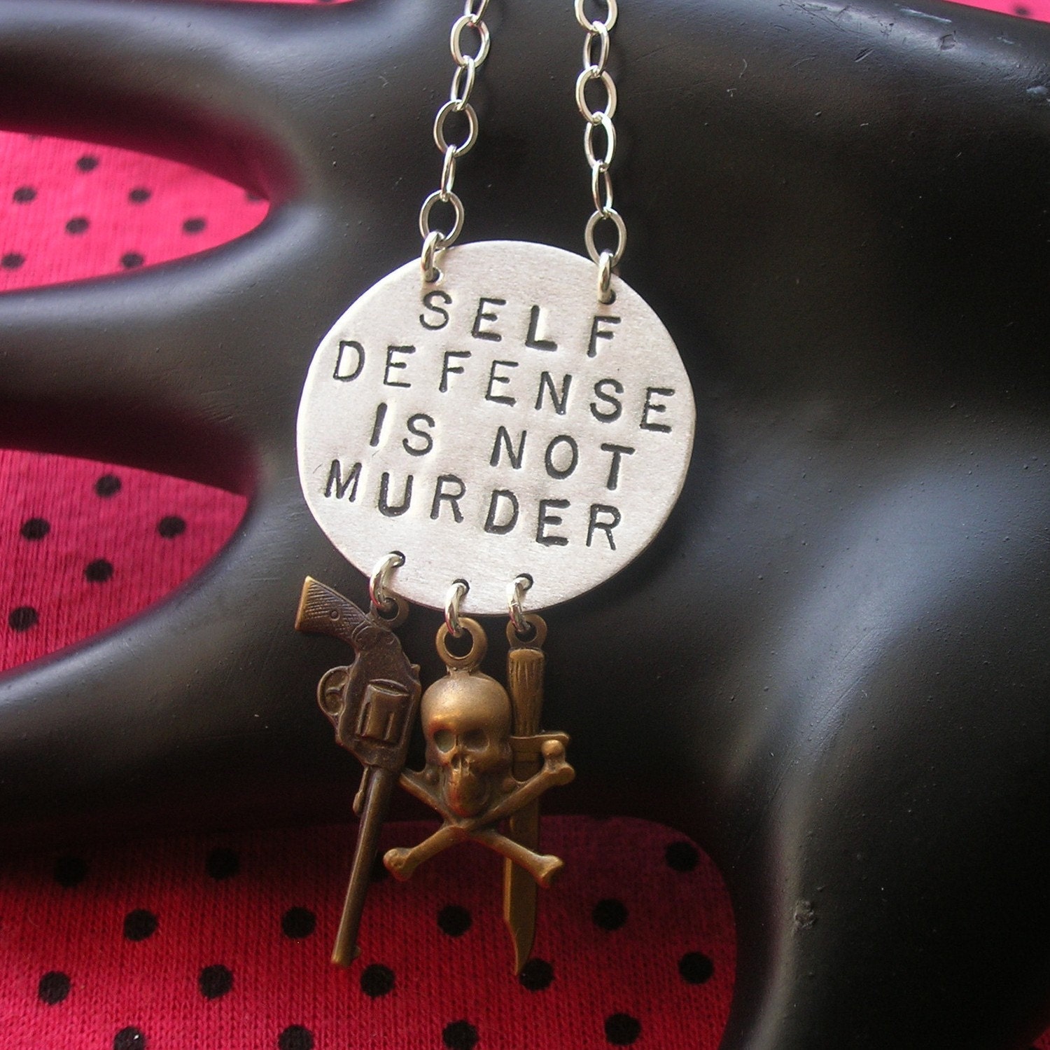 SELF DEFENSE IS NOT MURDER--Hand Stamped Oxidized Sterling Silver Large Disc Necklace with Skull, Dagger, and Revolver Charms