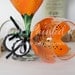 Tiger lilly wine glass in orange that is hand painted. FREE personalization and dishwasher safe