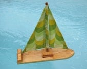 Nessie's Green Wooden Sailboat