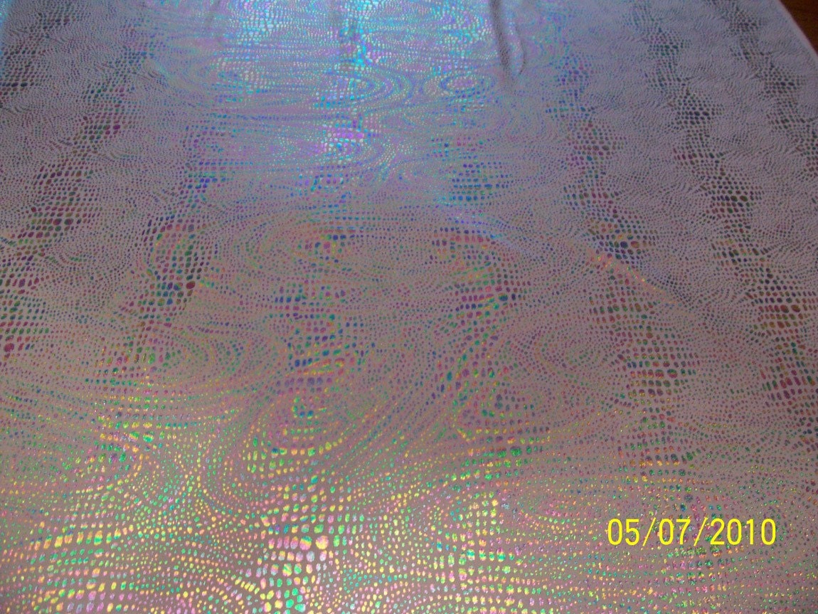 Jewlled pebble print on a lilac stretch fabric 2 yds
