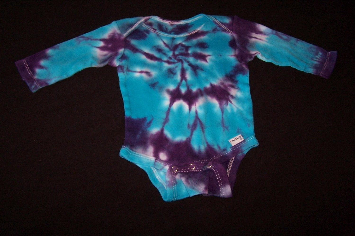 Turquoise, White, and Deep Purple Spiral Tie Dyed Long  Sleeve Baby Onesie Size 6-9m