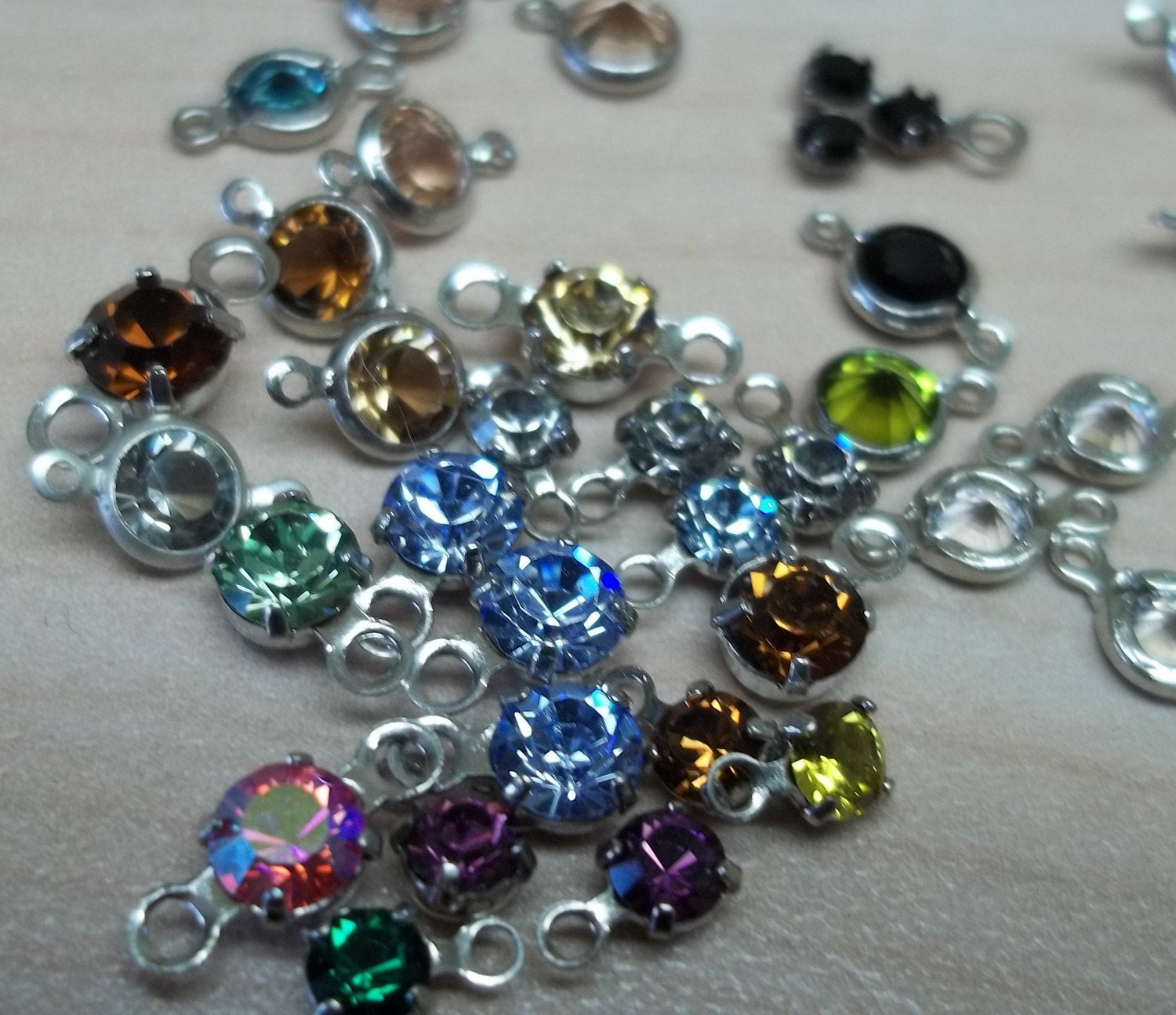 55 mixed colors 3mm swaroski crystal channel links 2 loops 1 loop