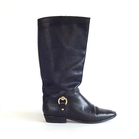 etienne aigner riding boots with stamped logo