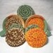 Scrubbies, made of yarn and come in a 3-pack. Eco-friendly scrubbers for the earth and the home. Mix and match your colors.