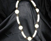 IVORY VINTAGE LUCITE CURVED BEADS