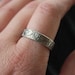 rustic bark wedding band ring with carved initials in hearts . simple personalized mens recycled silver wedding band