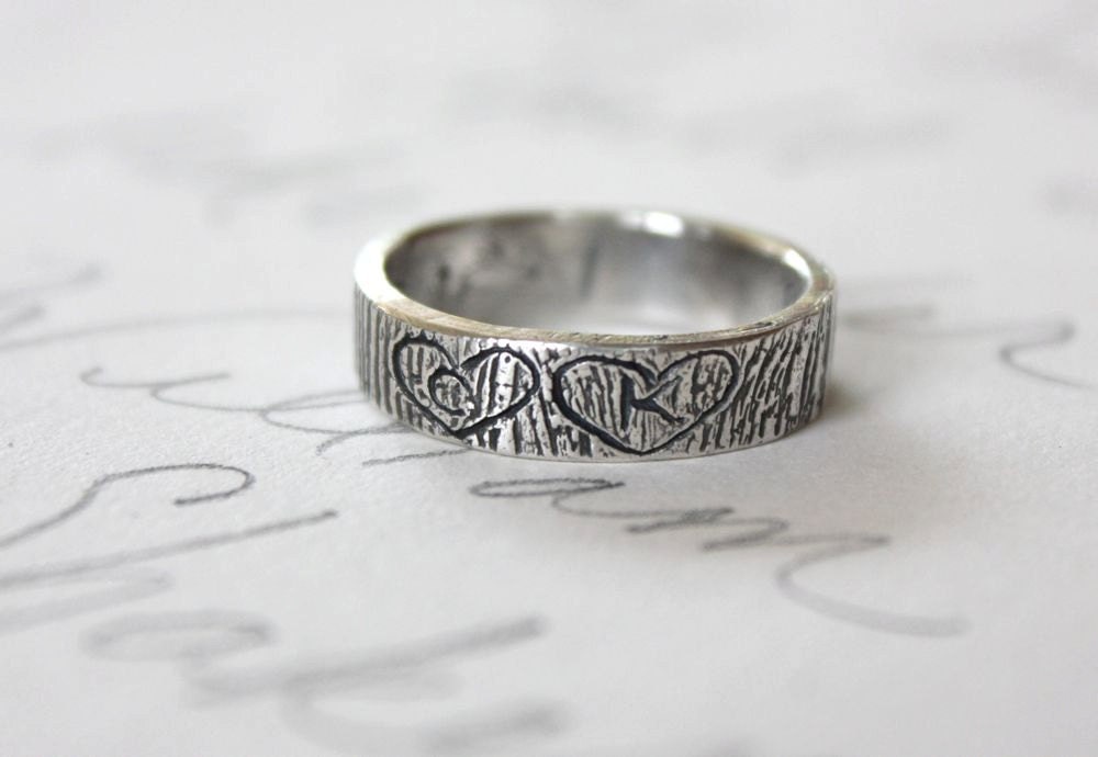 rustic bark wedding band ring with carved initials in hearts . simple personalized mens recycled silver wedding band
