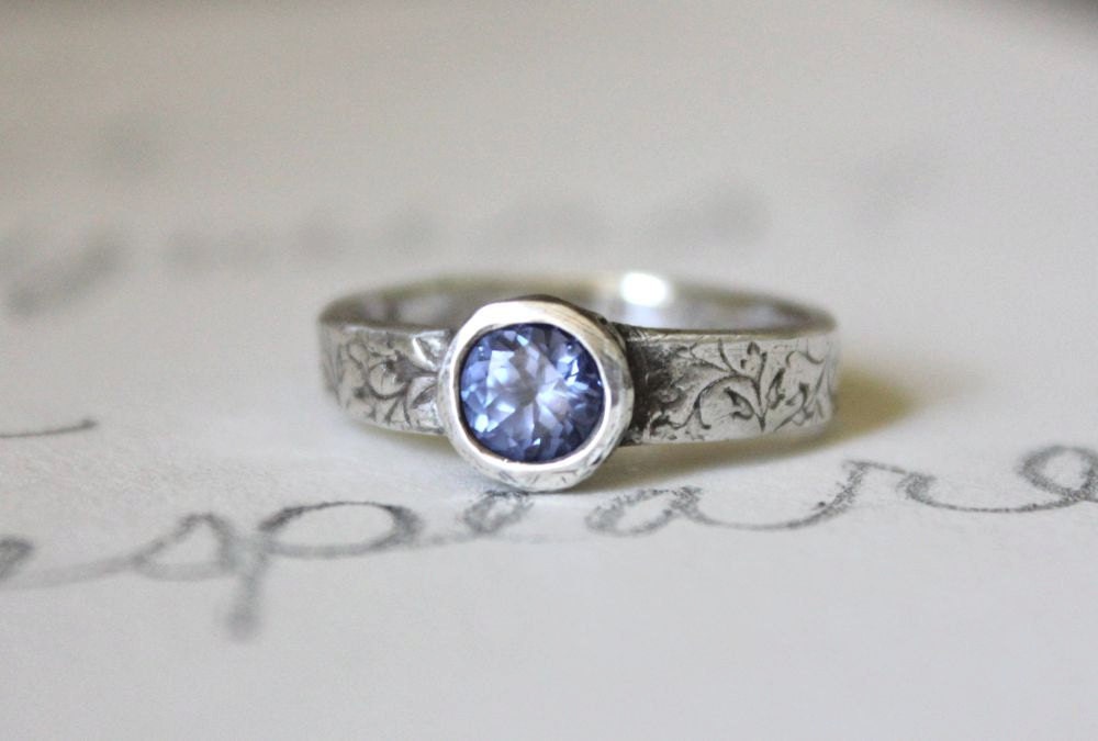 reserved for C . a custom spinel engagement ring with my river rock band