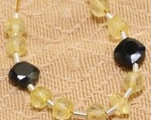 Faceted Lemon Quartz Rondelle and Black Spinel Cushion Beads