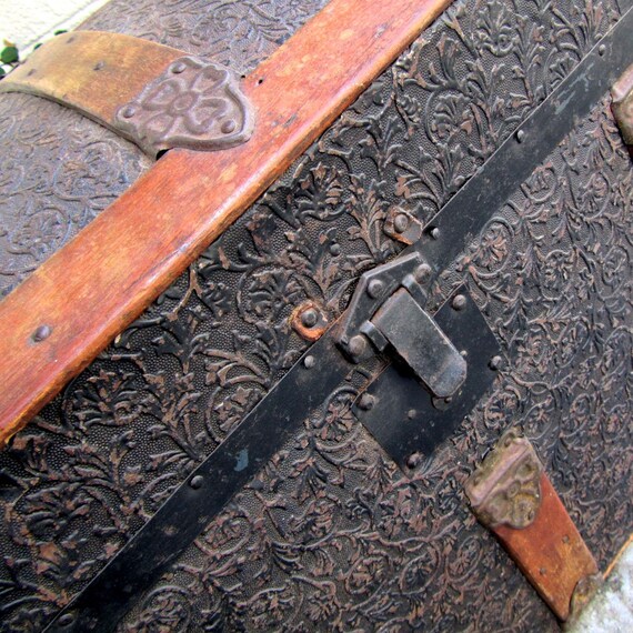 Antique pressed tin dome top steamer trunk