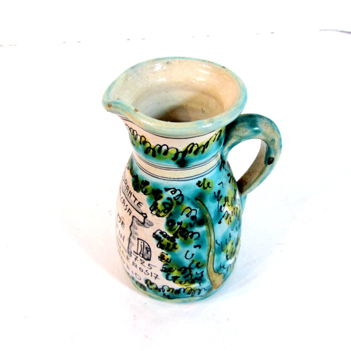 Vintage Sno de Botin advertising pitcher majolica glaze
