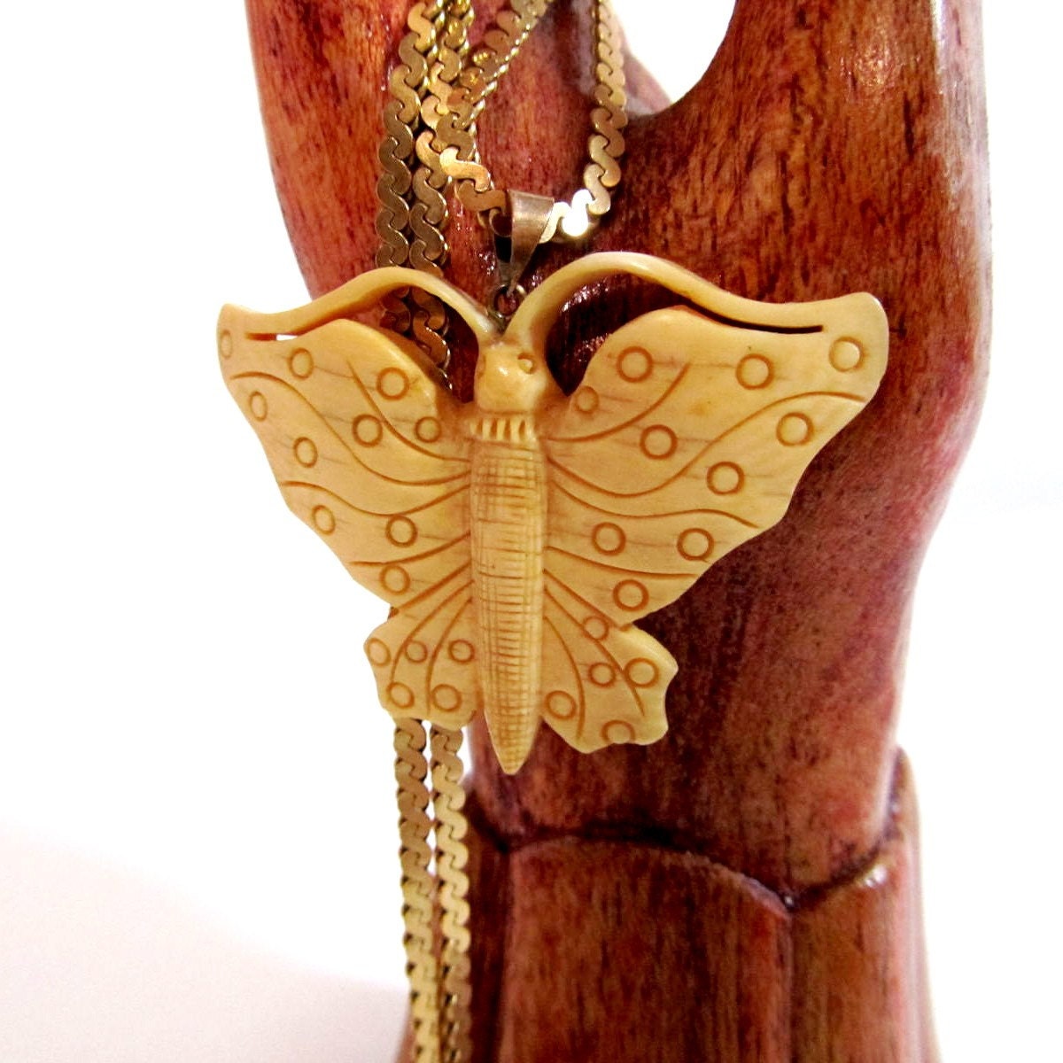 Vintage ivory celluloid butterfly pendant