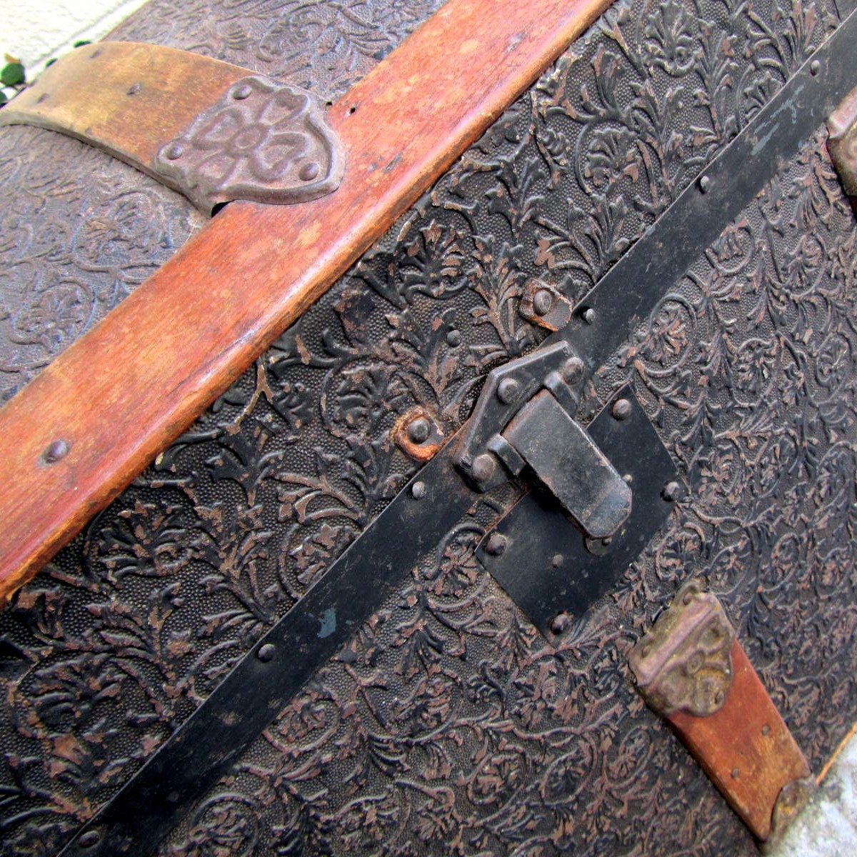 Antique pressed tin dome top steamer trunk