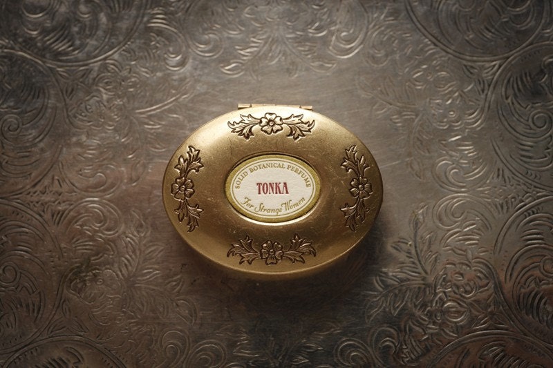 Single Note Solid Perfume in brass locket