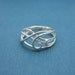 Arabesque ring