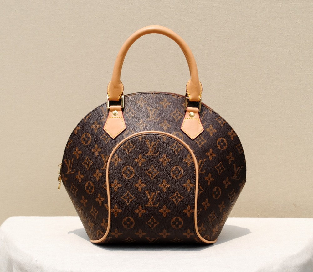 80s Louis Vuitton Monogrammed Handbag by badbabyvintage on Etsy
