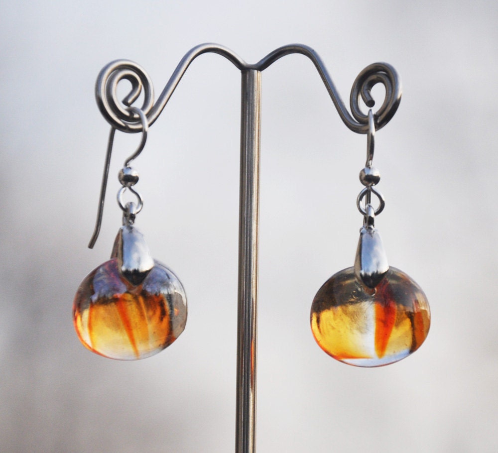 Swirls of red and orange glass drop earrings