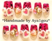 Decoden, Japanese nail art, hime gyaru, hot pink tips with gems  and hearts