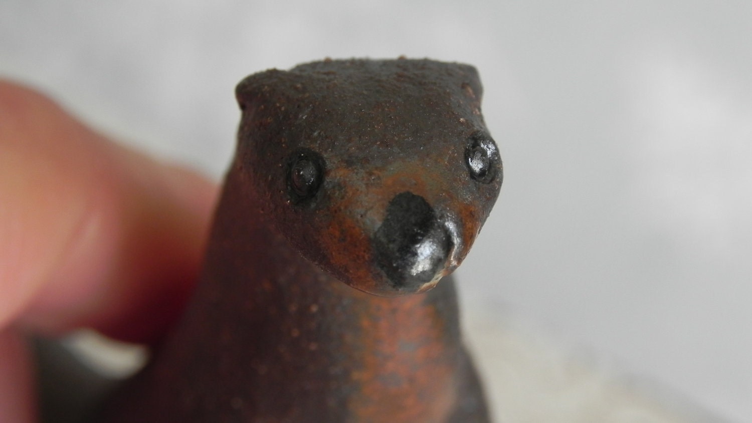 rugged stoneware otter